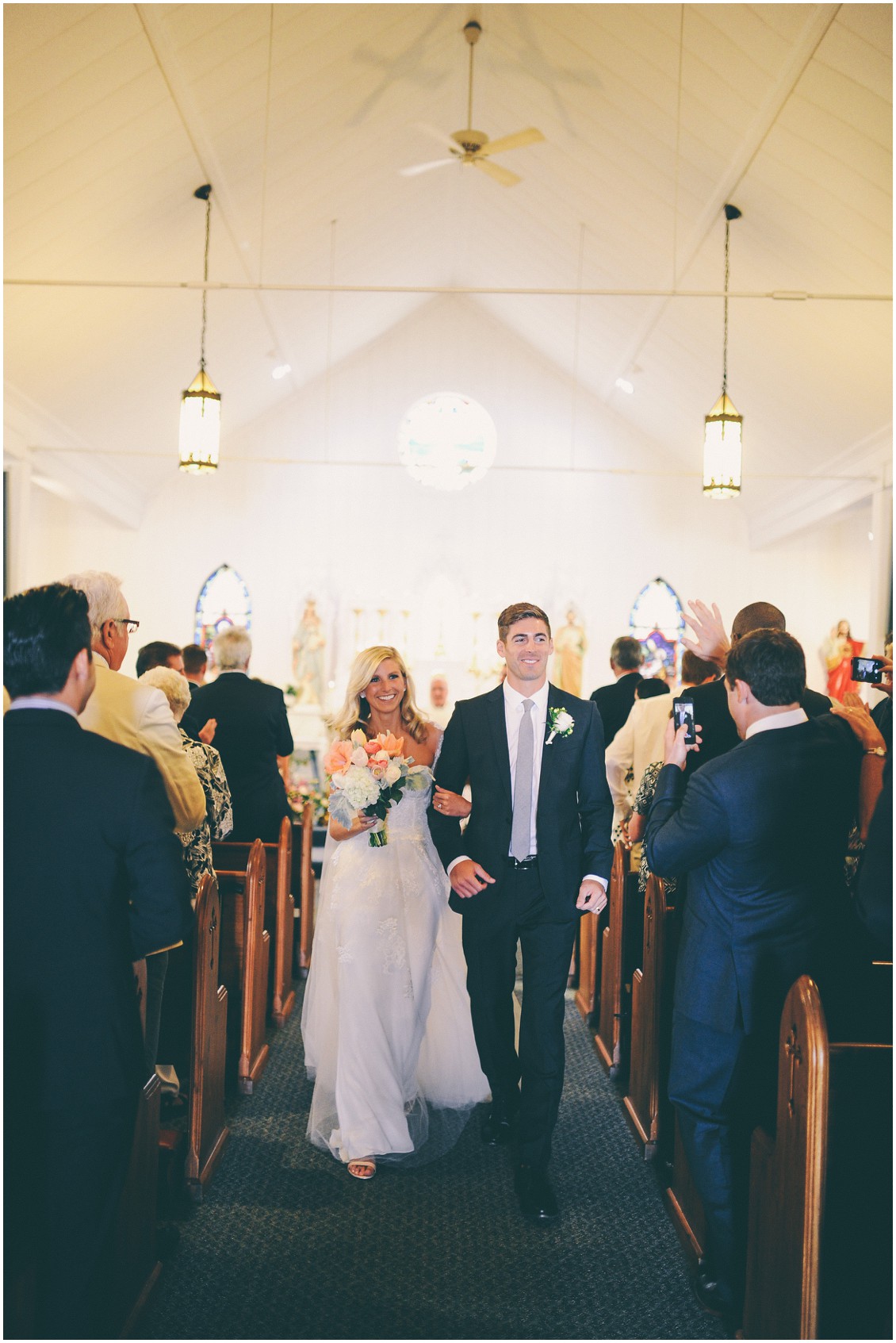 Bride and groom walking down the aisle together after the ceremony. | My Eastern Shore Wedding | 