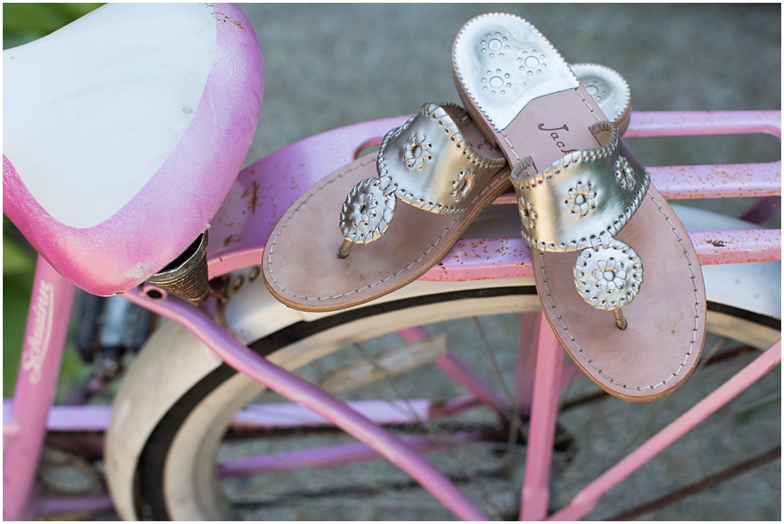 Gold, Jack Roger shoes on a hot pink and white bicycle detail shot. | My Eastern Shore Wedding | 