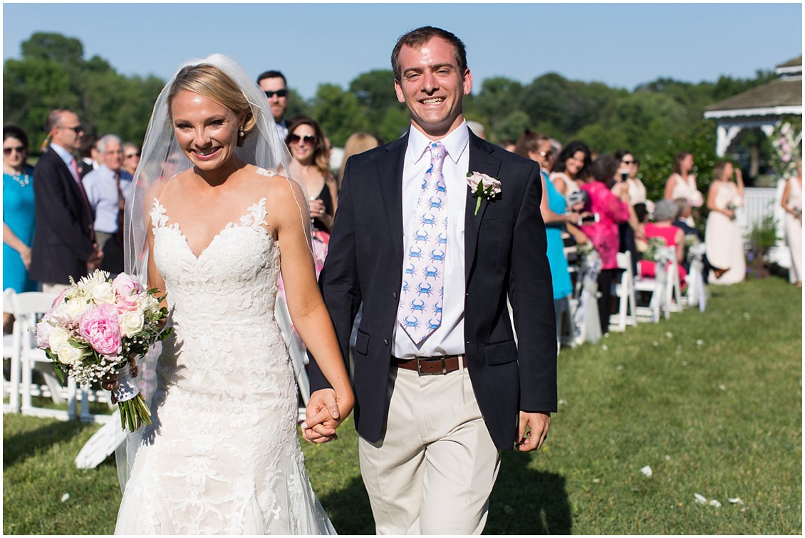 Bride and groom walking down the aisle together after being married. | My Eastern Shore Wedding | 