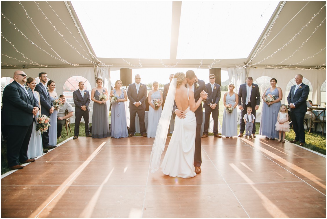 Bride and groom dancing under the skylights of white tent. | My Eastern Shore Wedding | 