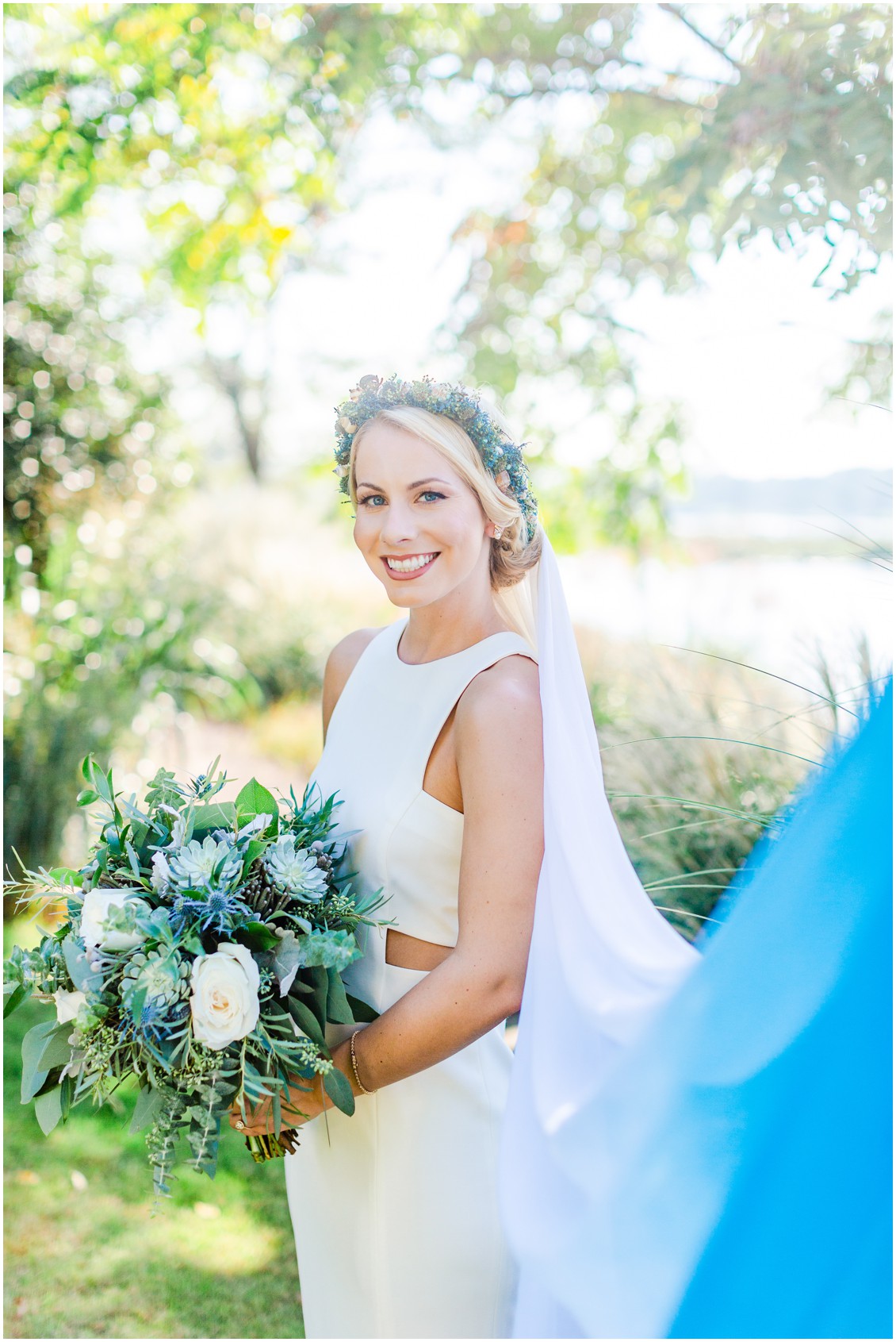 Bride with florals by Radebaugh Florist and white to blue ombré wedding veil. | My Eastern Shore Wedding | 