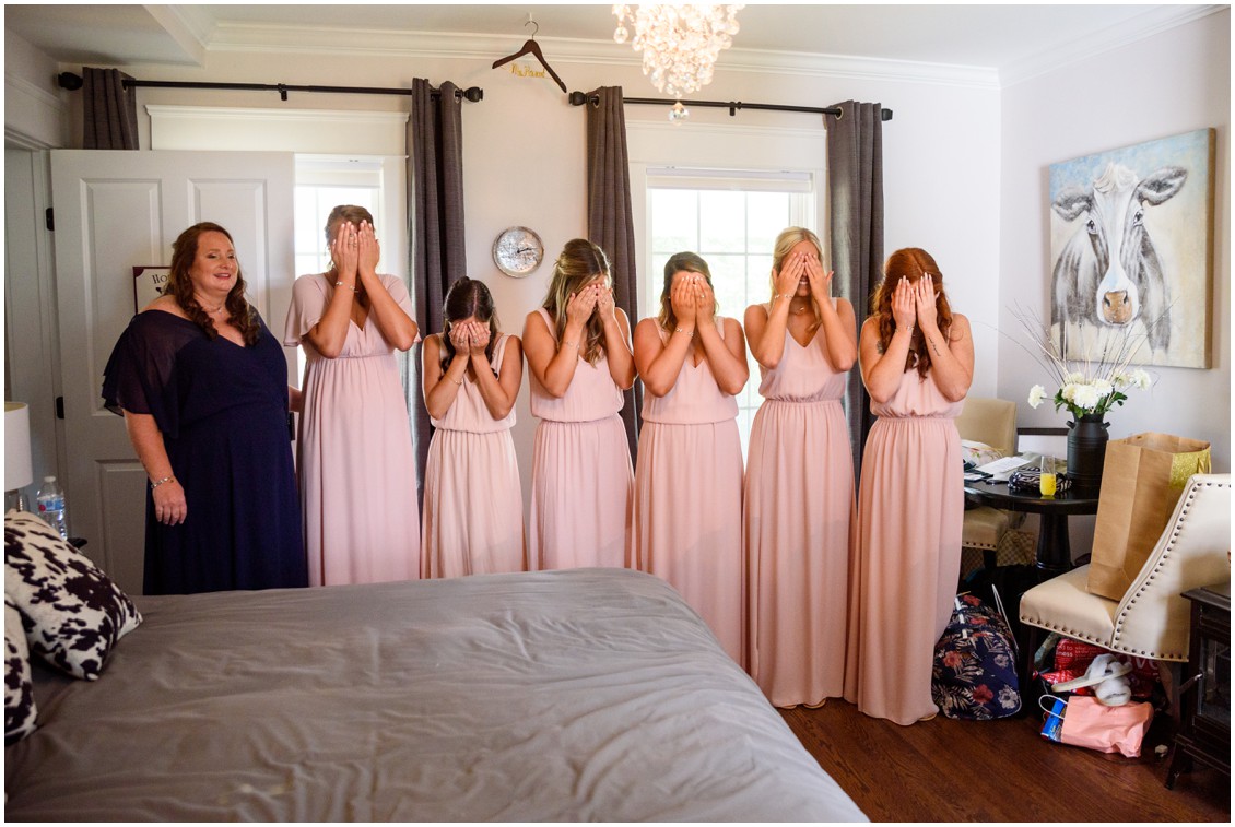 Bridesmaids in blush dresses first look with bride | My Eastern Shore Wedding | J Nicole Photography