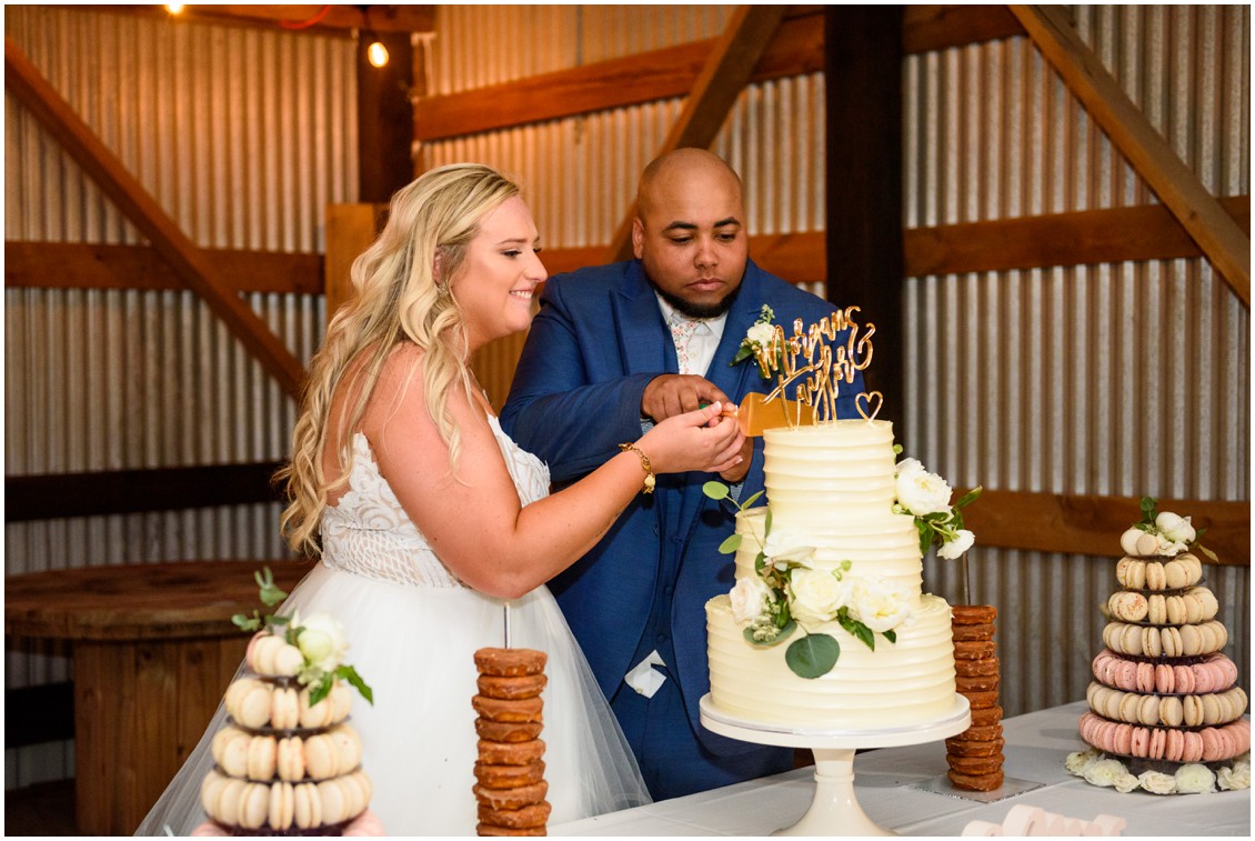 bride and groom cutting cake happily ever after | My Eastern Shore Wedding | J Nicole Photography
