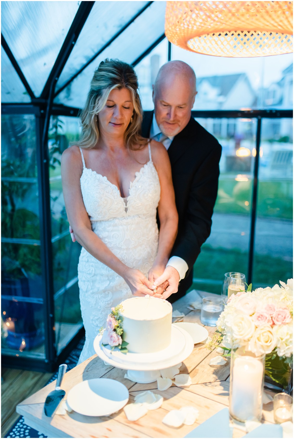 Bride and groom cutting cake romantic elopement| My Eastern Shore Wedding | Alexandra Kent Photography | Chesapeake Blooms | Steven Anthony Cakes