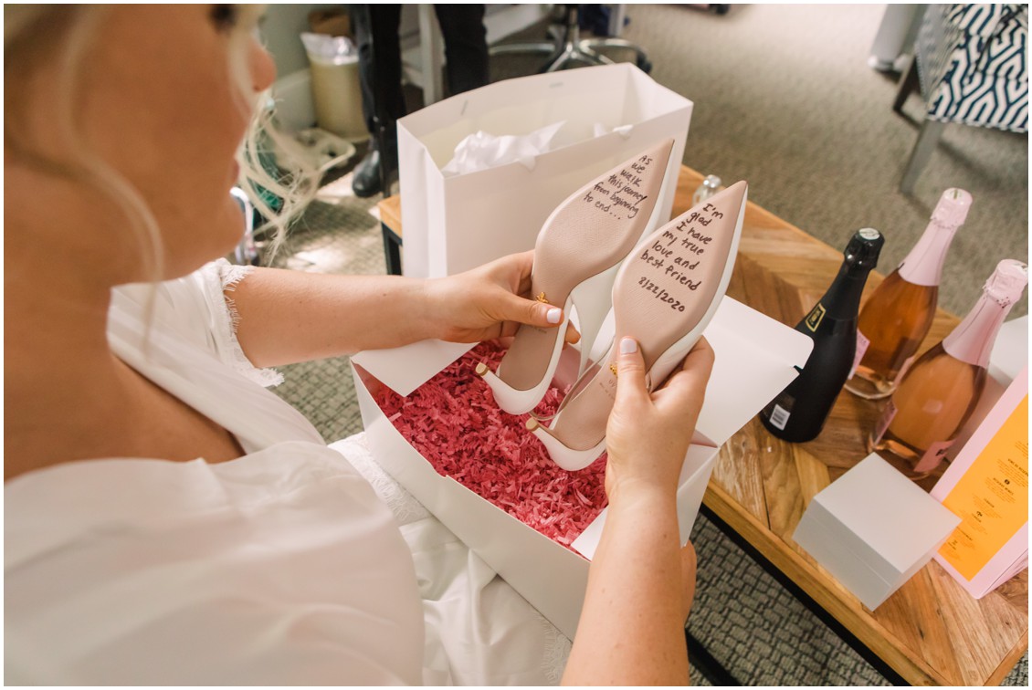 Bride with wedding shoes | My Eastern Shore Wedding | J. Starr's Flower Barn | Laura's Focus Photography