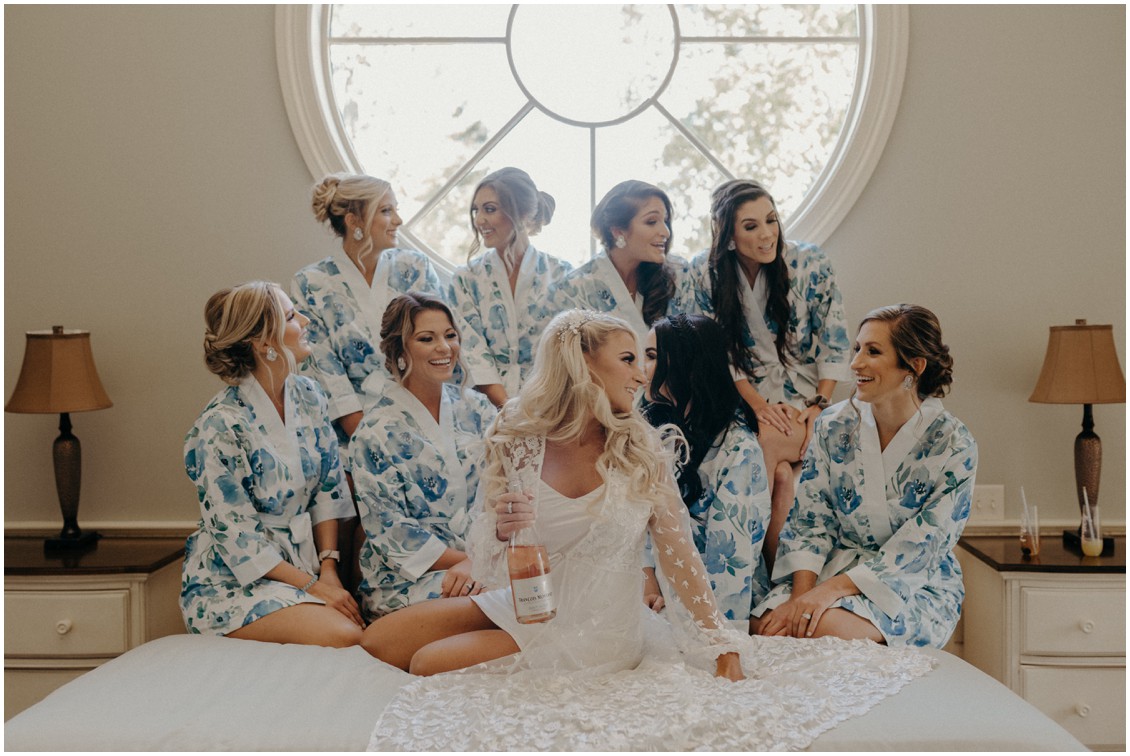 Bride with bridesmaids getting ready classic lux wedding | My Eastern Shore Wedding