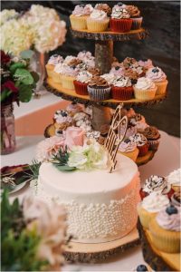 A cupcake bar and a beautiful wedding cake for a sweet treat at the end of the night. | My Eastern Shore Wedding | Laura's Focus Photography