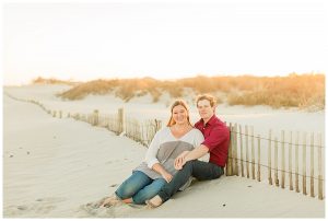 The couple sits on the beach to watch the sunset. | My Eastern Shore Wedding | Cassidy MR. Photography