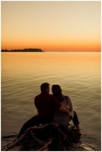 The couple enjoys a private bayside sunset full of radiant reds, outstanding oranges, and light yellows. | My Eastern Shore Wedding | Cassidy MR. Photography