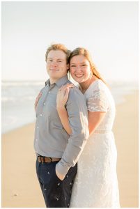 The couple poses for a beach portrait with a sweet embrace. | My Eastern Shore Wedding | Cassidy MR. Photography