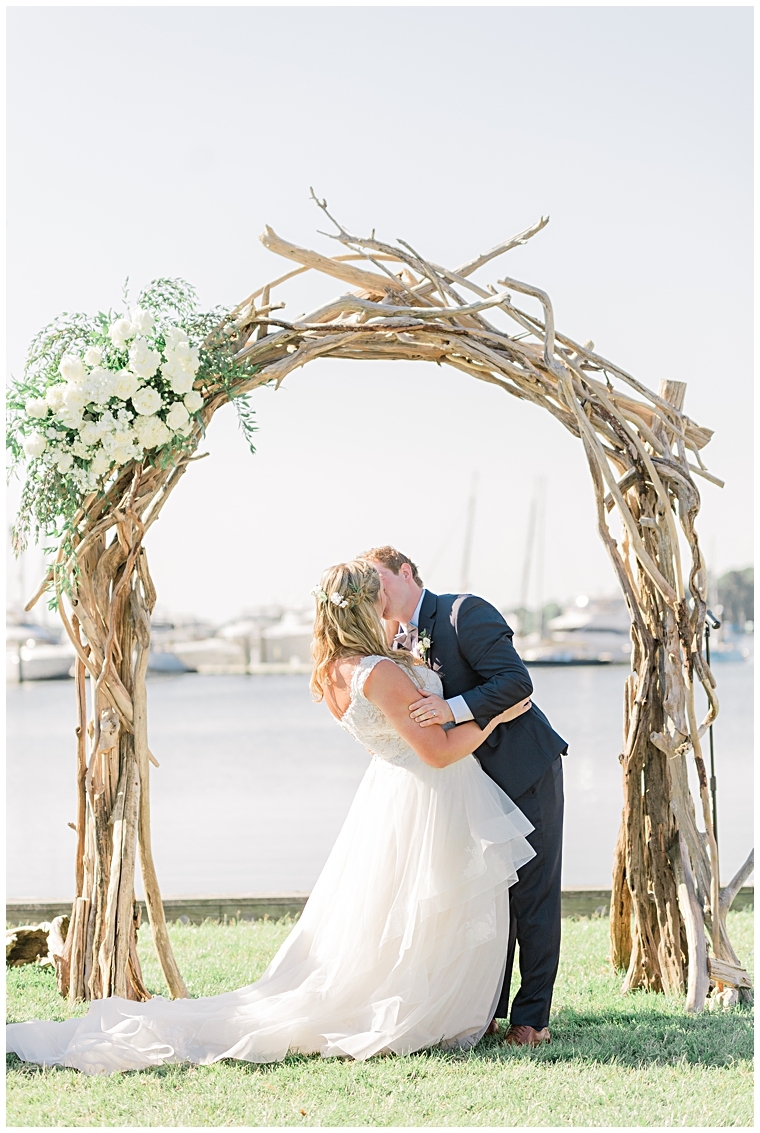 The bride and groom share their first kiss as husband and wife  | Inn at Haven Harbour 