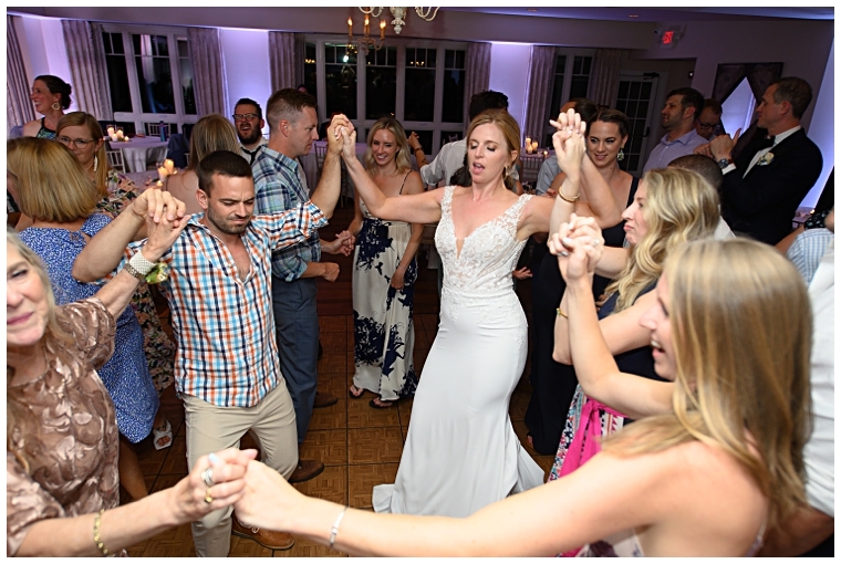 Guests dance to celebrate the newlyweds