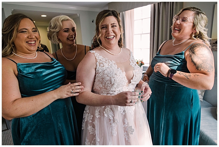 The bridesmaids help the bride get ready for her big day | My Eastern Shore Wedding