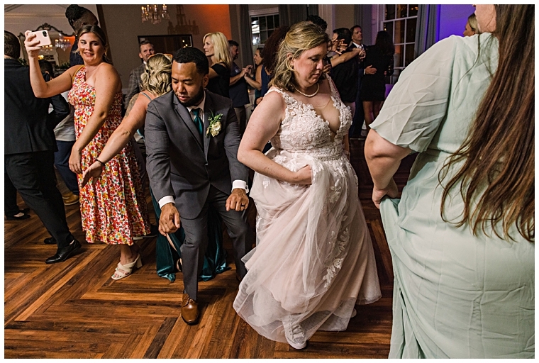 The newlyweds dance with their guests at their Tidewater reception