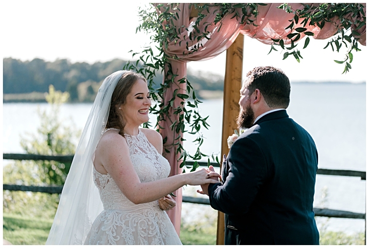 The bride and groom exchange rings during their micro-ceremony at Great Oak Manor. | My Eastern Shore Wedding