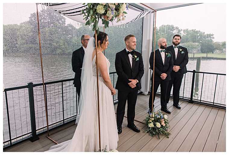 A rainy day made for the perfect waterfront wedding under the cover at the Oaks Waterfront Pier | Laura's Focus Photography | My Eastern Shore Wedding