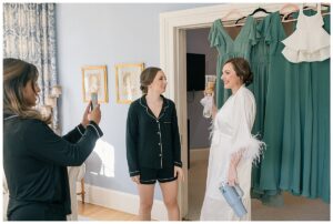 The bridesmaids help the bride get ready for her big day