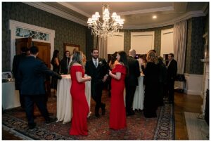 The guests enjoy cocktails and dinner during the reception