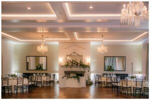 The dining tables surround the dance floor with their gold details to border the reception area