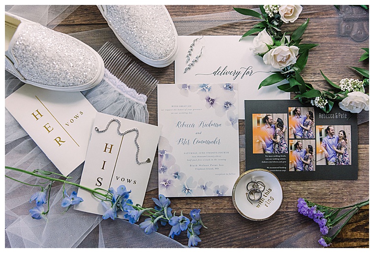 The invitation suite is decorated with details of the day including the wedding bands, vow books, florals, and the bride's sequined sneakers.