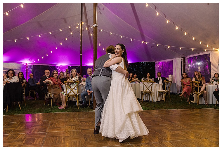 The newlyweds have their first dance as husband and wife on the dance floor at Black Walnut Point Inn | Laura's Focus Photography