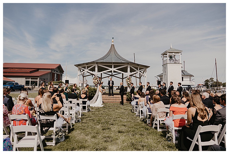 CBMM sets the perfect stage for this waterfront ceremony with gorgeous blue skies and green grass as the bride and groom exchange their vows.
