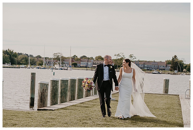 The newlyweds take a walk together and enjoy the waterfront views at the Chesapeake Bay Maritime Museum