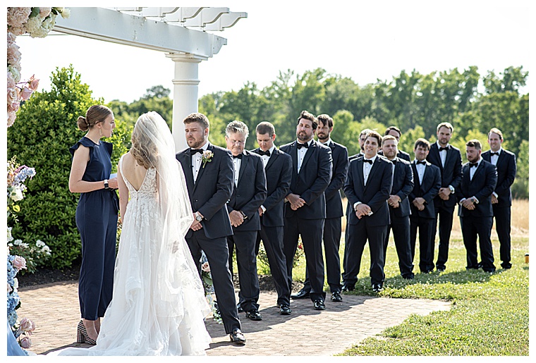 Groomsmen are decked out in chic black suits as they support the groom on his big day | My Eastern Shore Wedding, Eastern Shore Wedding Venue