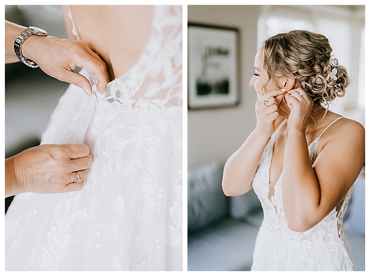 With the help of her mother, the bride gets dressed in a white lace gown with a sheer bodice