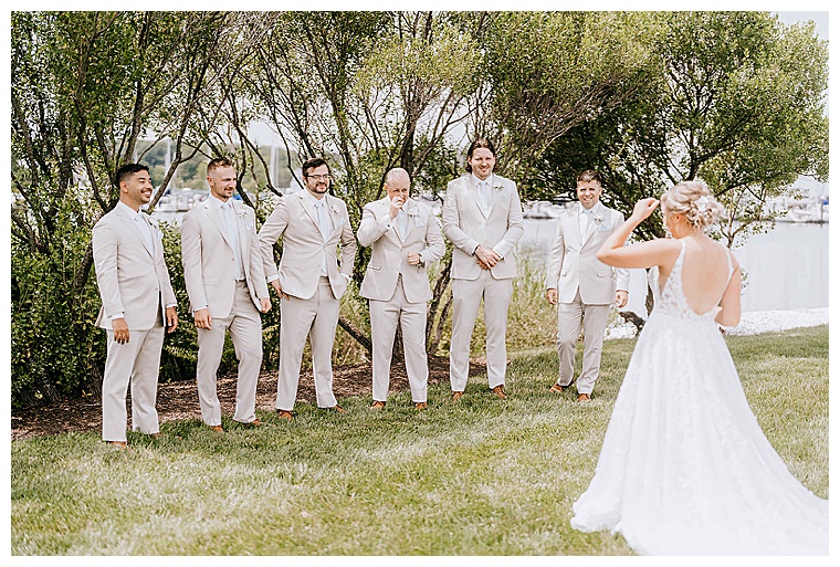 When the bride is besties with the groomsmen, a special boys' first look is a must for the wedding day timeline