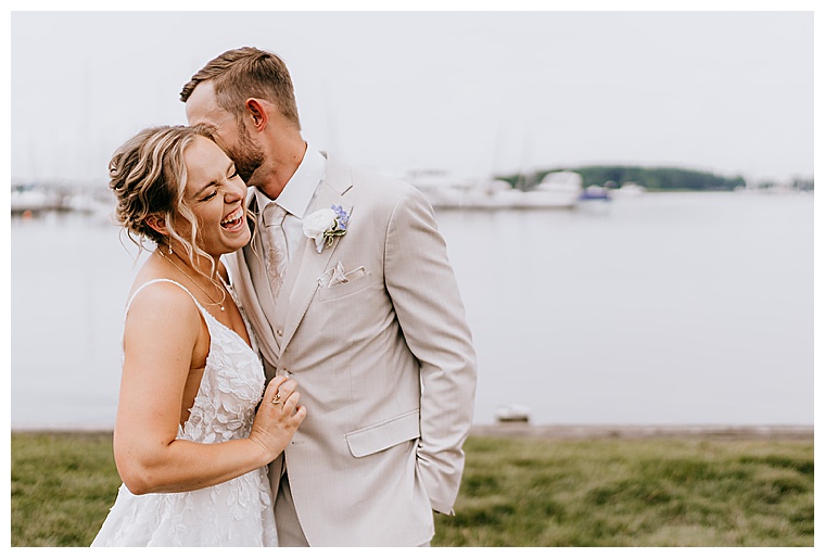 The bride and groom share a private moment at the waterfront before their Haven Harbour wedding | Rock Hall Wedding | My Eastern Shore Wedding