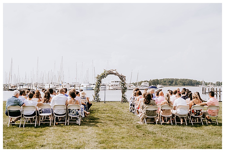 Guests await the bride and groom's arrival at on the lawn at Haven Harbour Marina Resorts