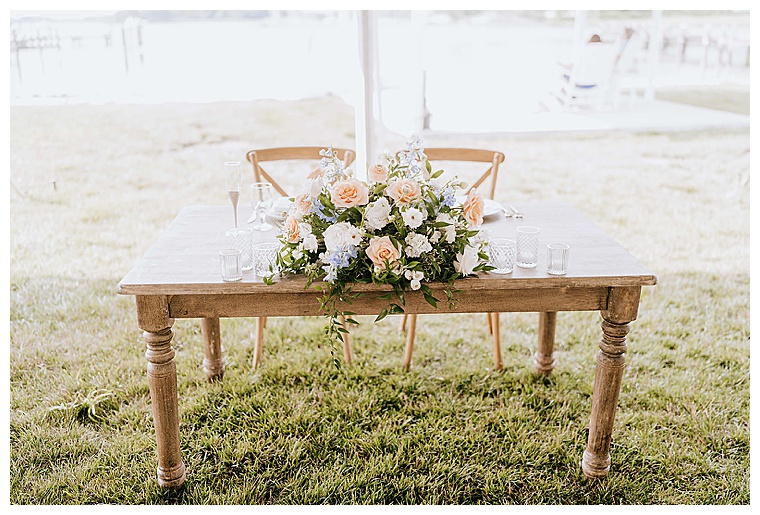 A rustic farmhouse table for the newlyweds from Eastern Shore Tents and Events
