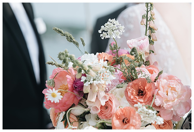 Pastel peach florals with pops of pink and green