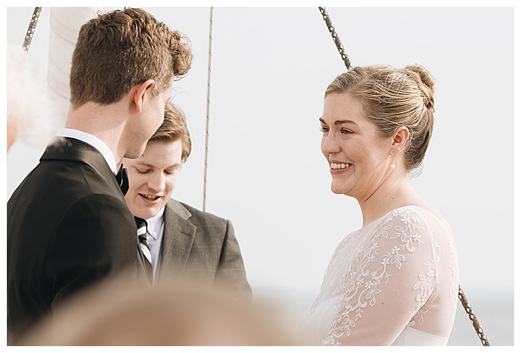 All smiles at this romantic sailboat ceremony on the Tred Avon River