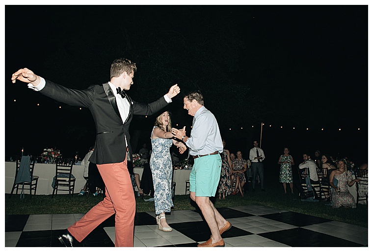 Guests danced the night away on this classic checked dance floor under the stars.