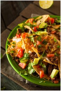 Loaded Beef and Cheese Nachos with Cilantro and Lime