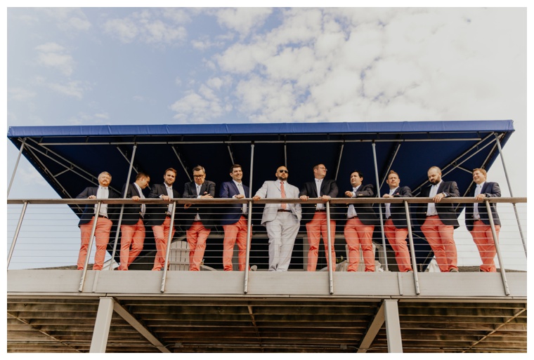 The groomsmen pose for a group picture at the Tred Avon Yacht Club