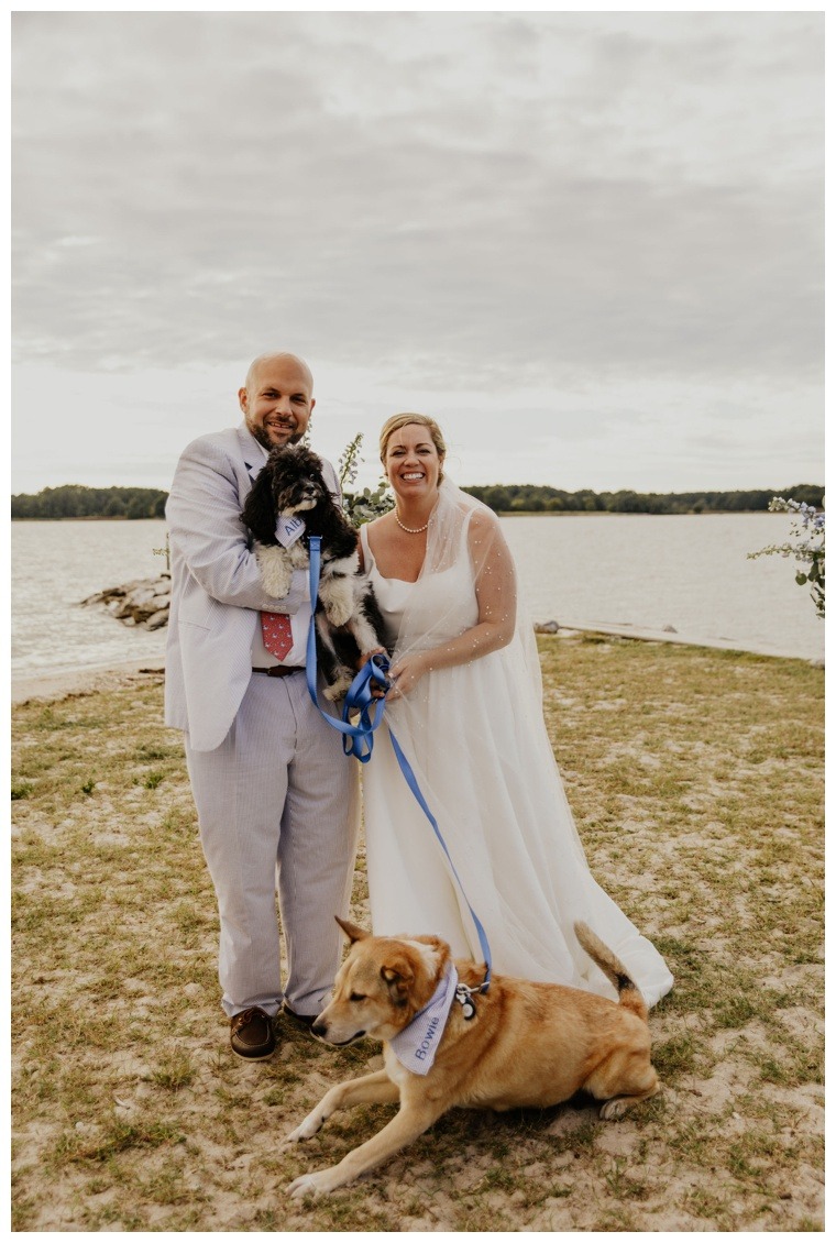The bride and groom celebrate their marriage with their furry friends