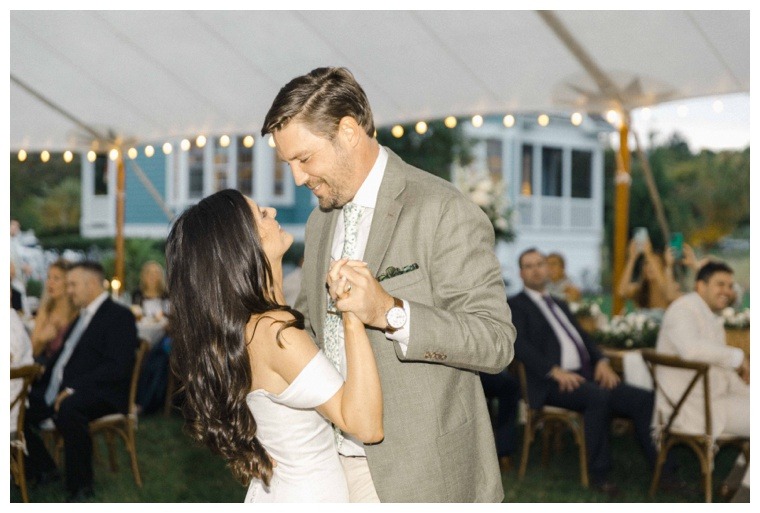 The bride and groom make their debut as newlyweds as they share in their first dance