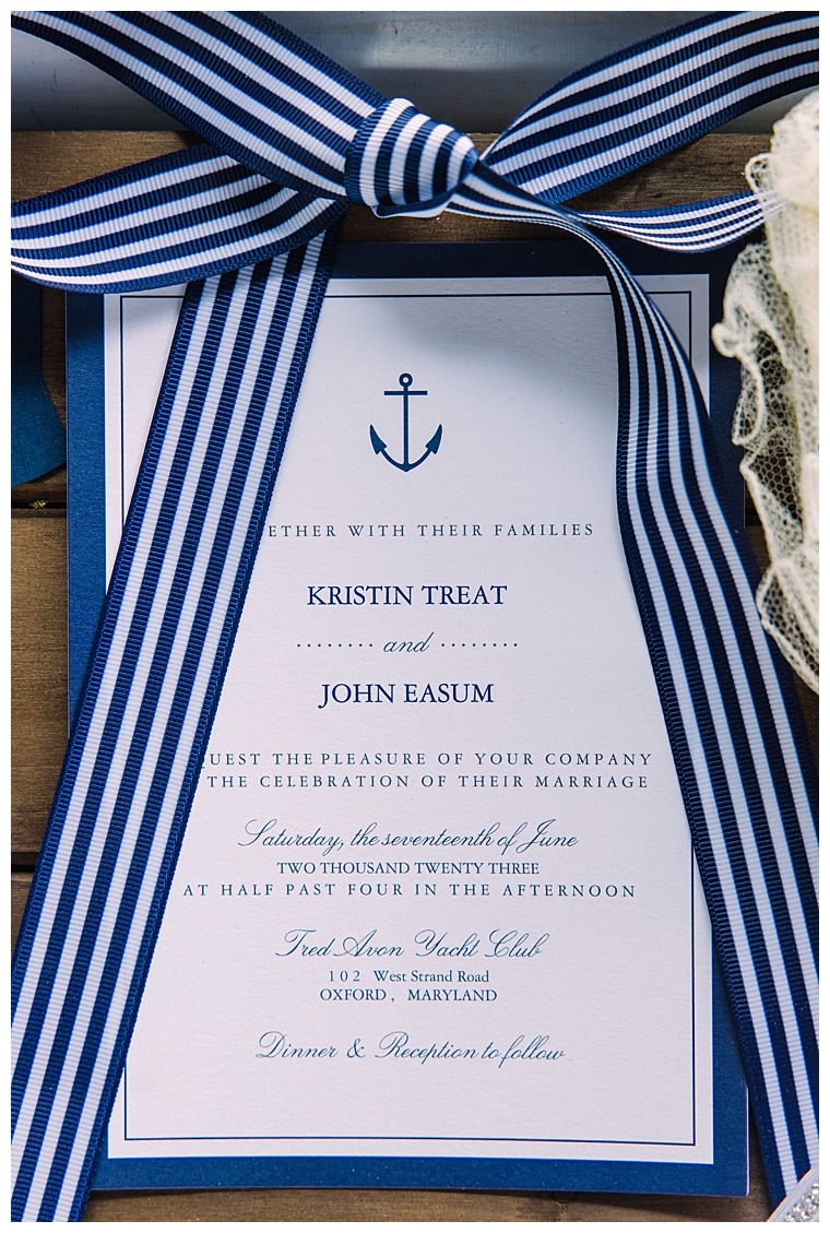 Blue and white invitations for a nautical and wintery wedding day