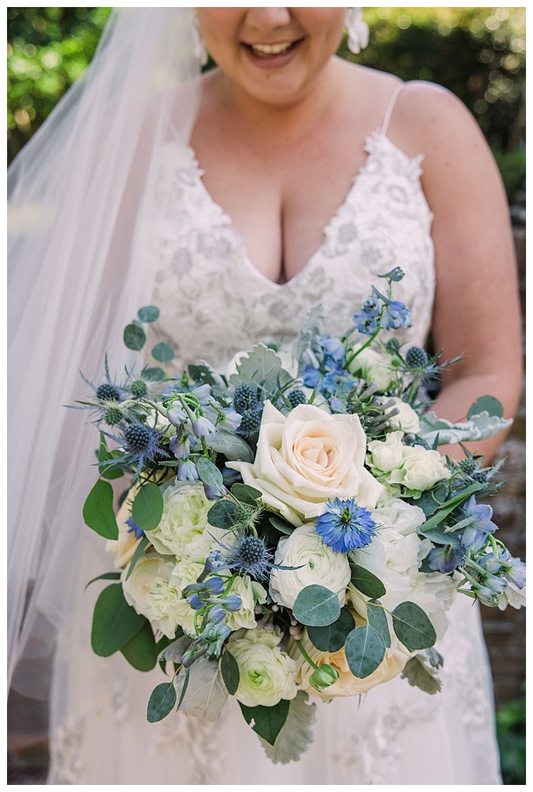 Bridal bouquet | white roses | lace wedding gown